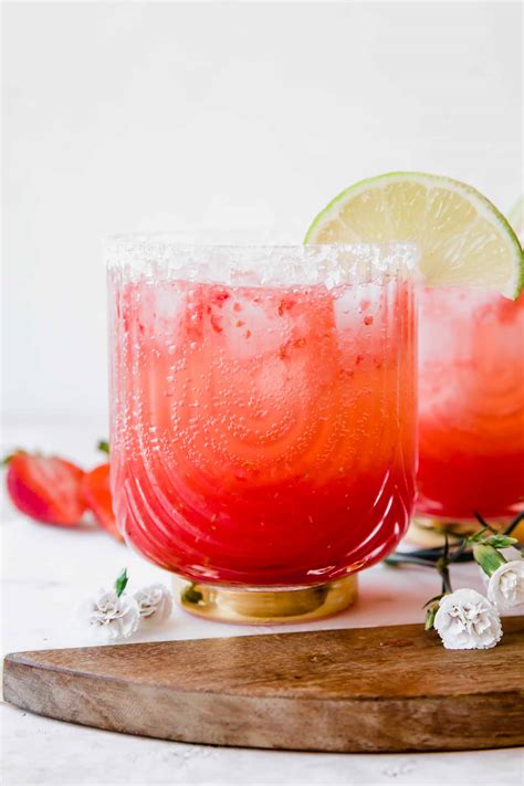 Mocktail margarita - 1. In a blender, combine honey, limeade, lime juice, grapefruit juice, almond and orange extracts and ice. Blend until smooth. 2. Rim a margarita glass with salt and chili. 3. Pour blended margarita in glasses. Garnish with a lime.